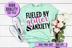 glitter and anxiety design on green t-shirt with pink roses and shoes on wood background