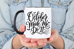 Digital Halloween graphic with the phrase “October Made Me Do It” in dramatic black lettering. Decorative bats and a spiderweb give the design a spooky October theme.