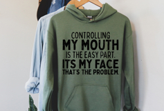 Black typography quote design featuring a snarky saying about controlling your mouth and facial expressions, ideal for DIY apparel and sarcastic gift projects.