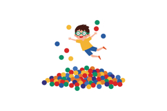Happy child jumping joyfully amidst colorful balls in a play Product Image 1