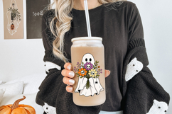 Floral ghost PNG featuring a smiling sheet ghost carrying a Halloween-inspired flower bouquet. Includes skull flower centers and whimsical botanical details.