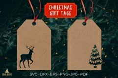 christmas tree and deer svg design being used as a Christmas gift tag.