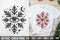 Gothic Christmas Eye Snowflake SVG design – mystical black and white holiday illustration with all-seeing eye, snowflakes, moon and stars. Perfect for gothic Christmas decorations, t-shirts, mugs, stickers, cards and more.