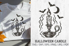 Halloween Retro Candle SVG featuring a spooky vintage candle in holder with crescent moon and bats. Perfect for vintage-style Halloween crafts such as t-shirts, mugs, tote bags, stickers, invitations, posters, and seasonal decorations. Easy to use with Cr