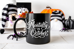 Black and white Halloween digital design that says “Mentally In October” with bold script lettering, bats, a spider web, and a hanging spider.
