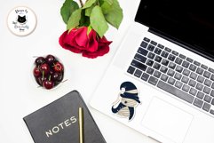 Halloween sticker of a mummy on a white notebook