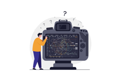 Photographer using digital camera with star chart on screen Product Image 1