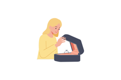 Woman joyfully opening a ring box while wearing a yellow swe Product Image 1