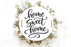 Farmhouse style Home Sweet Home SVG with flowing script lettering and decorative flourishes, ideal for front porch signs, wood signs, entryway wall decor and Cricut or Silhouette cutting machine craft projects.