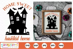 Home Sweet Haunted Home on a sign 