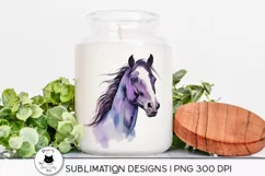 black horse design shown on a candle