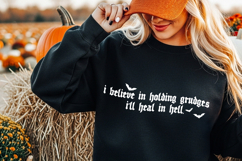 Funny witchy Halloween SVG and PNG design with a snarky grudge quote, black bat details, and a moody gothic style.