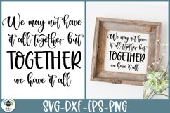 We may not have it all together but together we have it all quote being shown on a square wood farmhouse style sign