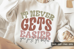 It Never Gets Easier You Just Get Be - Inspirational Design Product Image 1