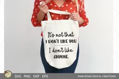 sarcastic svg file quote being used as a print on a tote bag