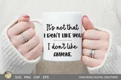 sarcastic cut file quote being used on a white mug