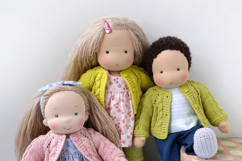 Knitted cardigan and matching booties for 11-13 inch (28-33 cm) Waldorf dolls, including PDF patterns and step-by-step tutorials for creating handmade doll clothes, perfect for DIY knitting projects, printable and beginner-friendly.