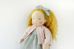 Knitted cardigan and matching booties for 14-16 inch (36-40 cm) Waldorf dolls, including PDF patterns and step-by-step tutorials for creating handmade doll clothes, perfect for DIY knitting projects, printable and beginner-friendly.