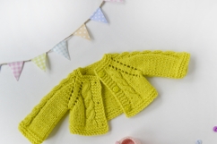 Knitted cardigan and matching booties for 11-13 inch (28-33 cm) Waldorf dolls, including PDF patterns and step-by-step tutorials for creating handmade doll clothes, perfect for DIY knitting projects, printable and beginner-friendly.