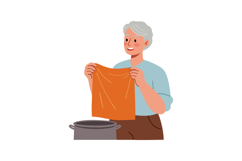 Senior person folding orange laundry towel near washing mach Product Image 1