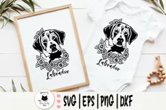 2 labrador drawings with flowers one in frame and the other on a white baby clothing
