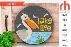 lake life svg, pelican silhouette, cottage hanger svg, lake house sign, welcome sign svg, wood camping sign, cabin door sign svg, round hanging sign svg, laser cut file, layered sign svg, vacation sign svg, glowforge cut file, cricut cut file
