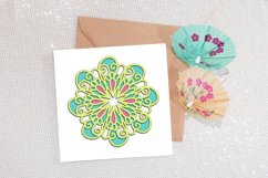 layered green mandala on card