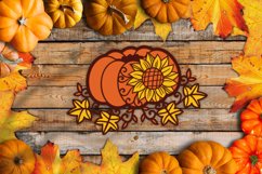 layered papercut pumpkin with leaves