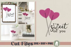 Valentines Day cut file shown on a sign and tote bag and coffee mug