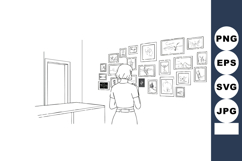 Woman viewing art gallery wall with framed pictures in minim Product Image 1