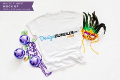 flat lay mockup image of white t-shirt with carnival mask and purple ornaments and beads
