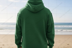 Green hoodie on the beach T-shirt Mockup Design Product Image 1