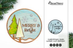 Round Christmas sign made for laser cutting machines. Includes the saying "Merry and Bright"and 2 Christmas trees.