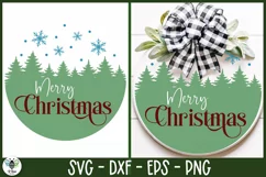 Christmas round sign with tree line and Merry Christmas being shown on a round wood sign