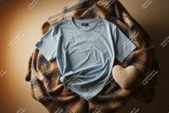 Light blue t shirt on plaid blanket image Product Image 1