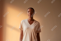 Woman wearing light colored v-neck t-shirt beige Product Image 1