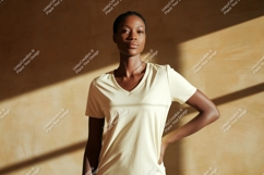 Woman wearing light yellow v-neck t-shirt clothing Product Image 1