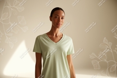 Woman wearing light green v-neck t-shirt image Product Image 1
