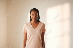 Woman wearing peach v-neck t-shirt clothing Product Image 1