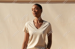 Woman wearing a light colored v-neck t-shirt Product Image 1
