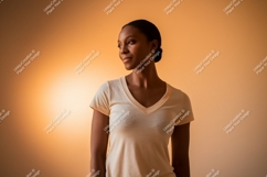 Woman wearing light colored v-neck t-shirt peach Product Image 1