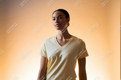Woman wearing light yellow v-neck t-shirt apparel Product Image 1