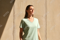 Woman wearing light green v-neck t-shirt image Product Image 1