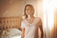 Woman wearing light pink t-shirt v-neck casual Product Image 1