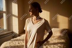 Woman wearing light colored v-neck t-shirt beige Product Image 1