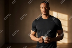 Man black shirt holding coffee cup image Product Image 1