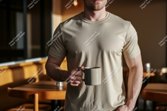Man wearing plain t shirt holding coffee mug t-shirt Product Image 1