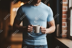 Man holding warm beverage blue t-shirt Product Image 1
