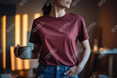Woman wearing maroon t shirt holding mug image Product Image 1