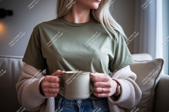 Woman holding mug wearing green t shirt image Product Image 1